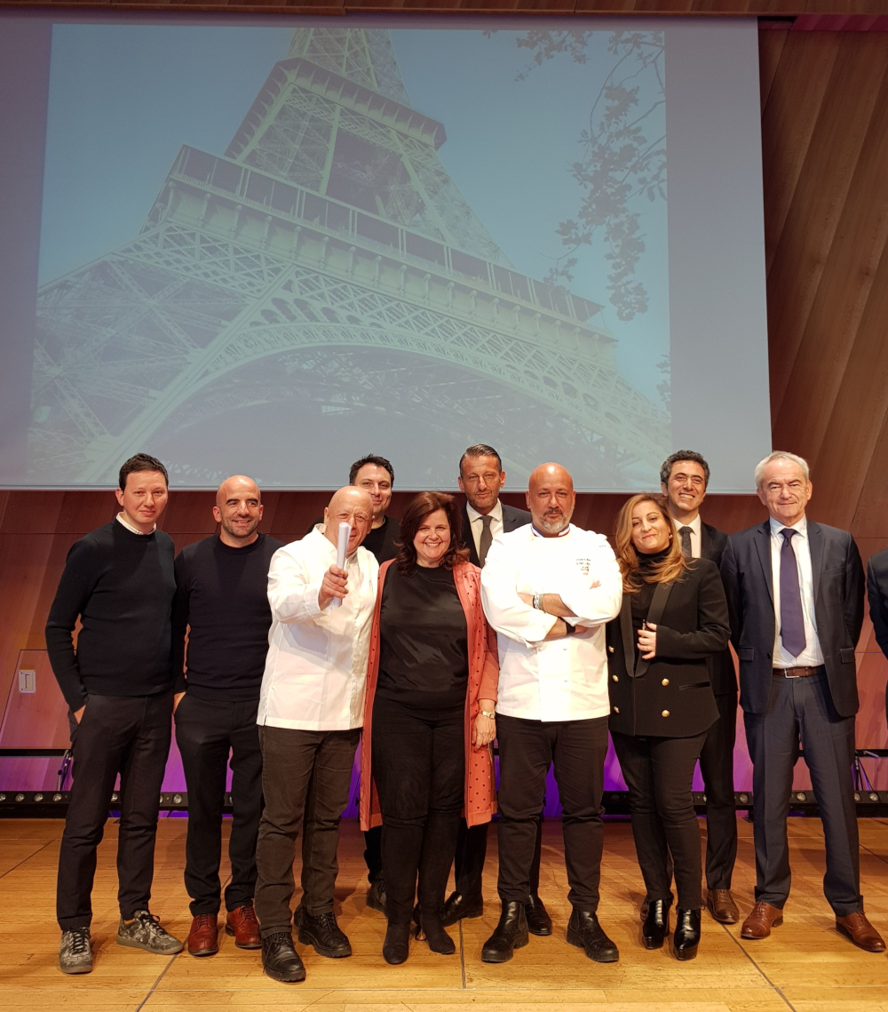 Joined by the Sodexo team and the projectu00e2u20acu2122s architects, chefs Thierry Marx (left) and Fru00c3u00a9du00c3u00a9ric Anton (right) presented the Eiffel Toweru00e2u20acu2122s new food offering. u00e2u20acu201d AFP-Relaxnews 